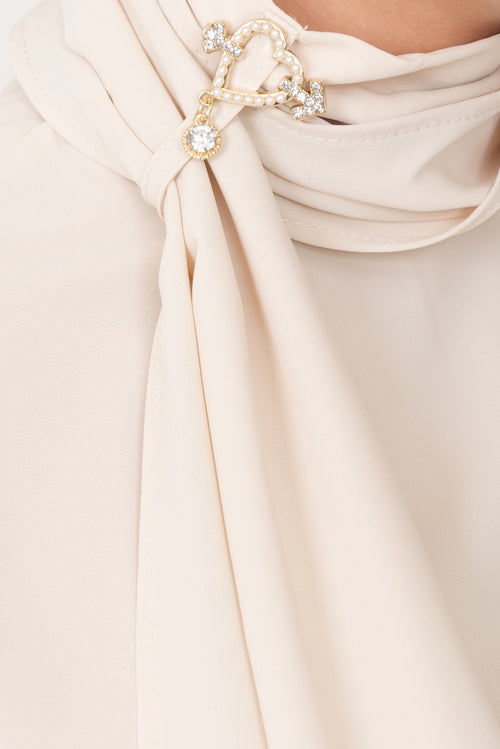 Blusa con accessorio No-nà per look elegante e alla moda
