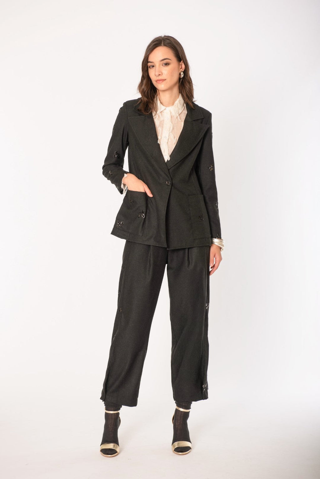 Completo paillettes elegante con inserto brillante