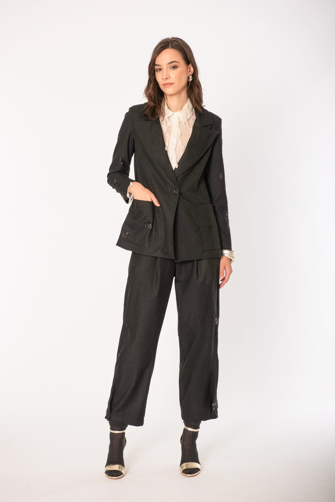 Completo paillettes elegante con inserto brillante